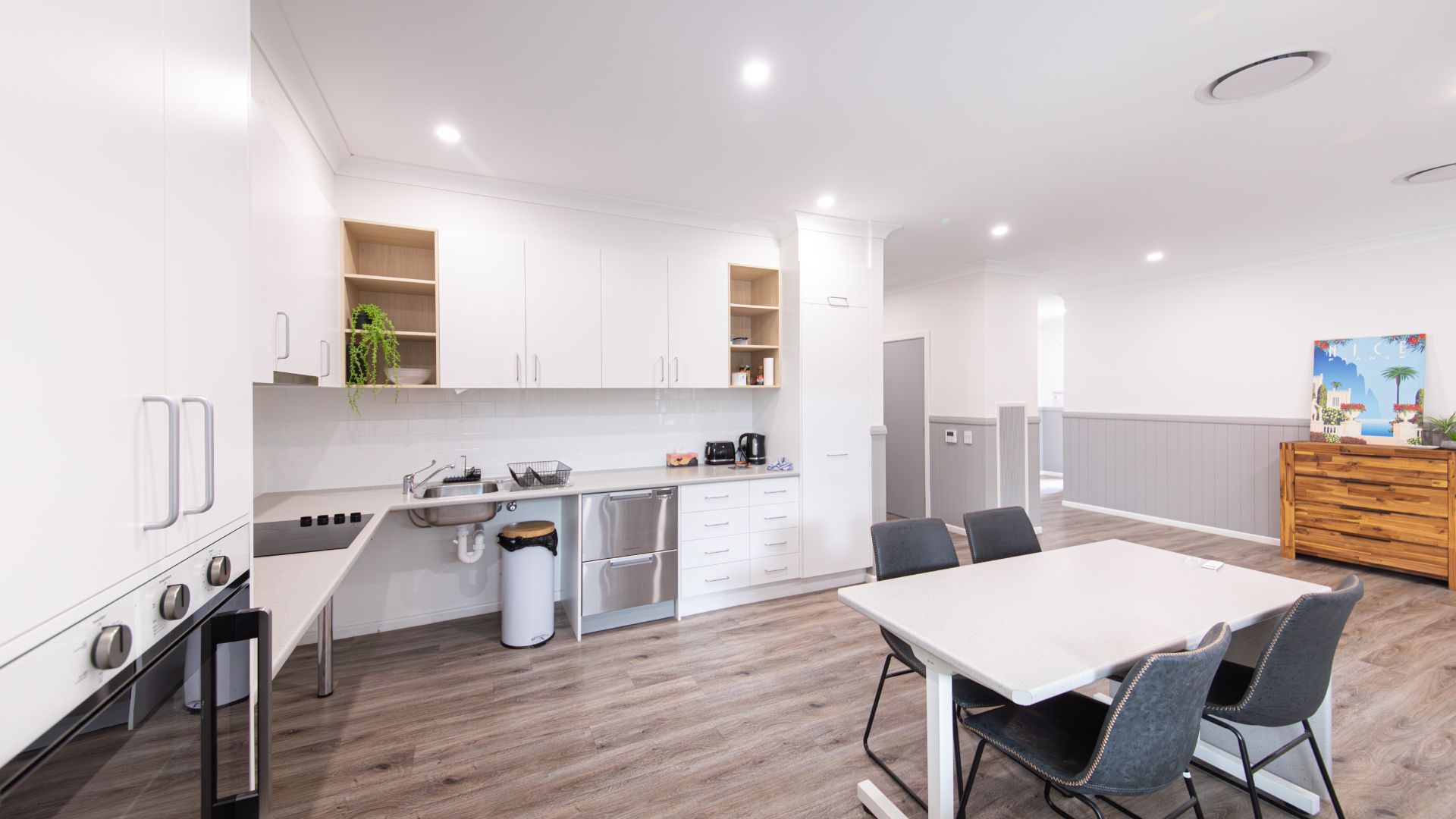 Modern kitchen and dining area with furniture