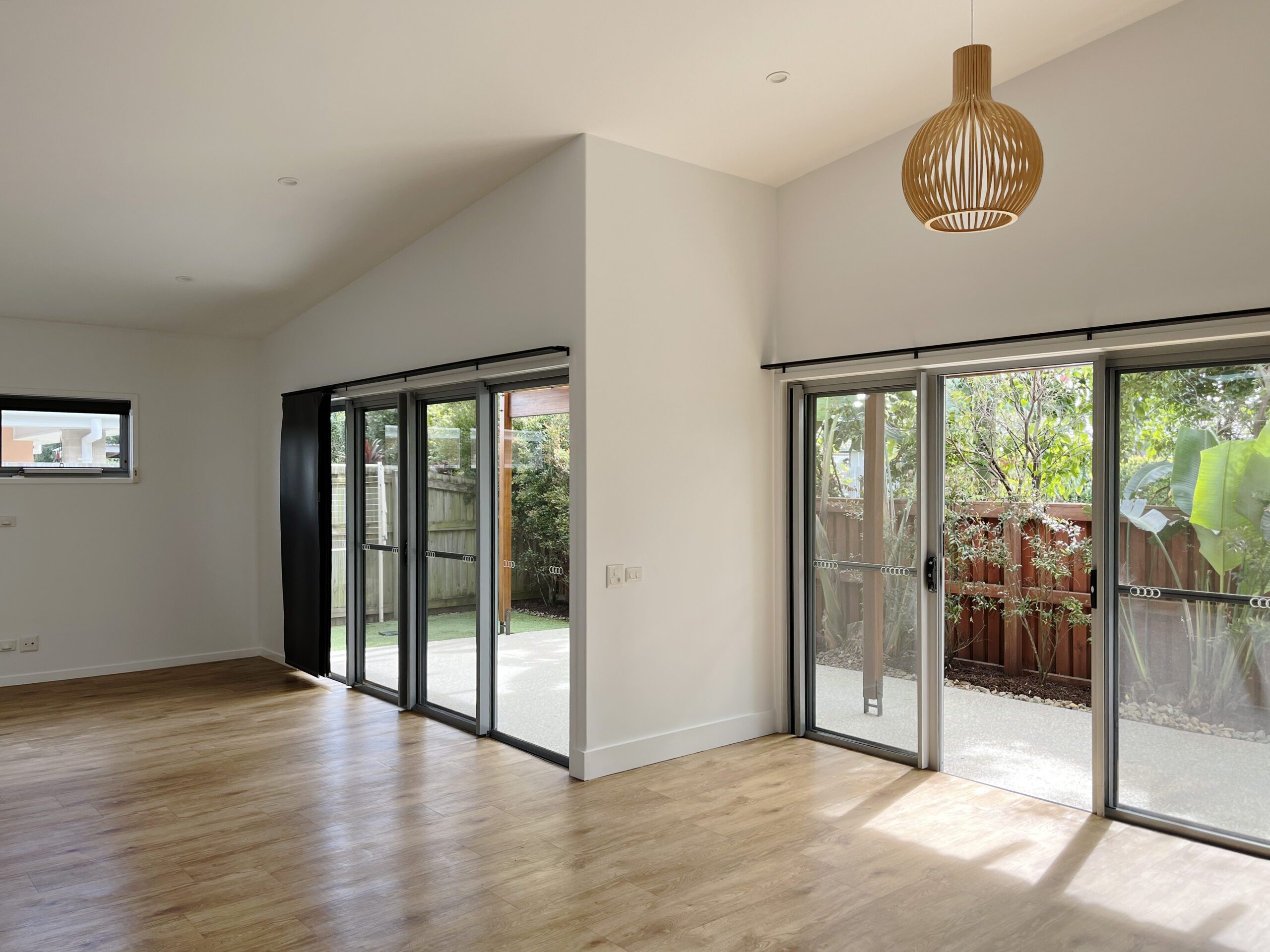 Modern living room with large glass doors